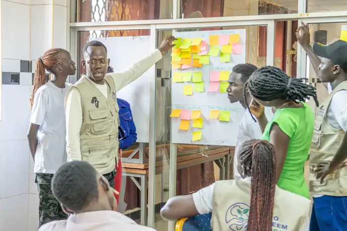 Facilitator leading an incubator session with entrepreneurs